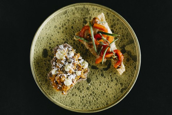 Cracker made from spent bread, with pimento, roasted macadamia butter; golden kelp crisp with dried organic carrots and carrot cream.