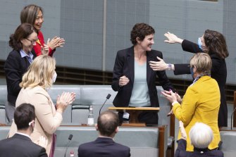 Independent Kate Chaney is congratulated by colleagues after delivering her first speech in the House of Representatives.