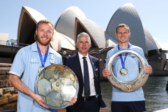 Steve Corica with Rhyan Grant and Alex Wilkinson, who are among approximately 20 Sydney FC players coming off contract.