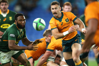 Nic White passing against the Springboks on the Gold Coast.