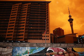 An orange glow darkened the skies over Auckland on Sunday. 