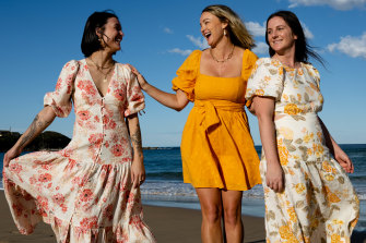 Designer, Kirstin-Lee Keysers, with Natalya Thorpe, left, and Candice Billingham, right, wearing her dresses from her label, Kivari,