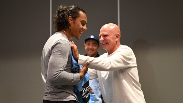 NSW great Peter Sterling presents Jarome Luai with his jersey before the State of Origin series decider.
