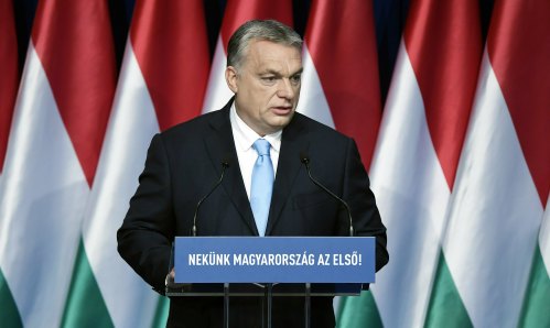 Hungarian Prime Minister Viktor Orban delivers his annual 'State of Hungary' speech in Budapest on Sunday. The inscription on the podium reads: "For us Hungary is the first!"