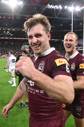 Cameron Munster celebrates the Maroons’ victory in game two.