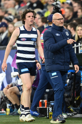 Max Holmes heads to the rooms after hurting a hamstring.