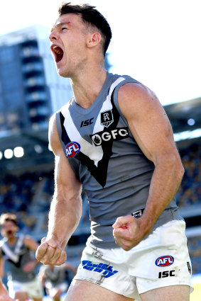 Robbie Gray celebrates his after the siren goal to seal victory for Port.