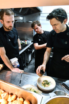 Ben Shewry, right, working on new recipes in the kitchen at Attica.