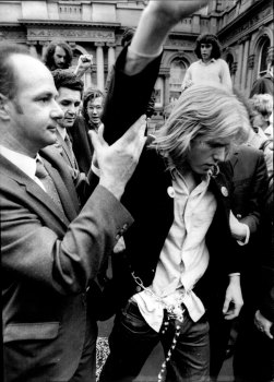 Police arresting one of the demonstrators. August 3, 1972. 