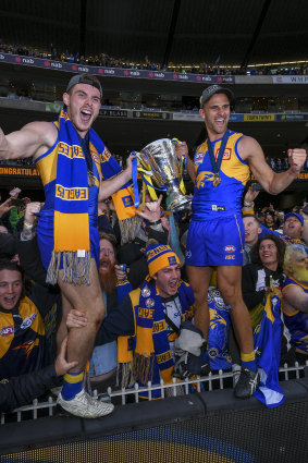 Luke Shuey (left) and Dom Sheed with the premiership cup.
