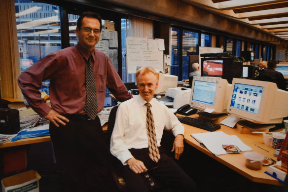 Former AAP editor John "JC" Coomber (right) with editor-in-chief Tony Vermeer in 2001 at the news wire's  Lang Street headquarters in Sydney. 