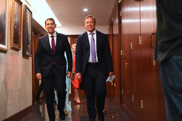 Queensland Premier Steven Miles (right) and deputy Cameron Dick (left) arrive to speak to the media