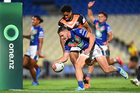 Luke Metcalf scores against the Tigers in the Pre-Season Challenge.