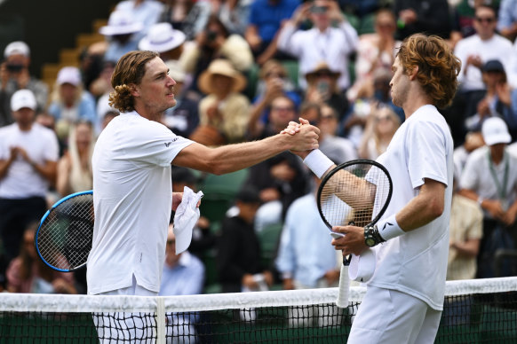 Max Purcell congratulates Andrey Rublev following their Men’s Singles first round match.