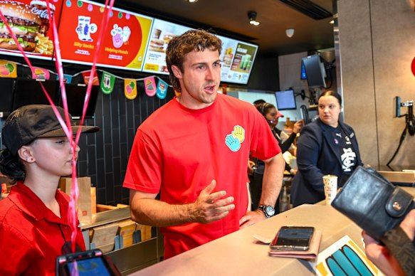 Essendon star Andrew McGrath on McHappy Day at McDonalds in Tullamarine on Saturday.