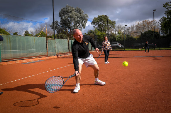 Treasurer Josh Frydenberg lets loose a killer forehand.