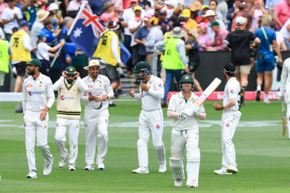 David Warner strides out to bat for the final time in test cricket.