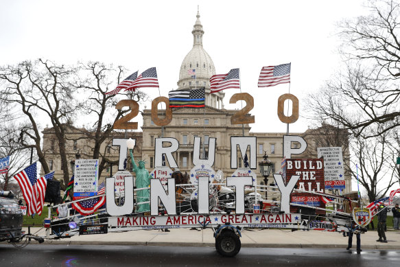 Trump supporters in Michigan call on Governor Gretchen Whitmer to lift coronavirus restrictions.