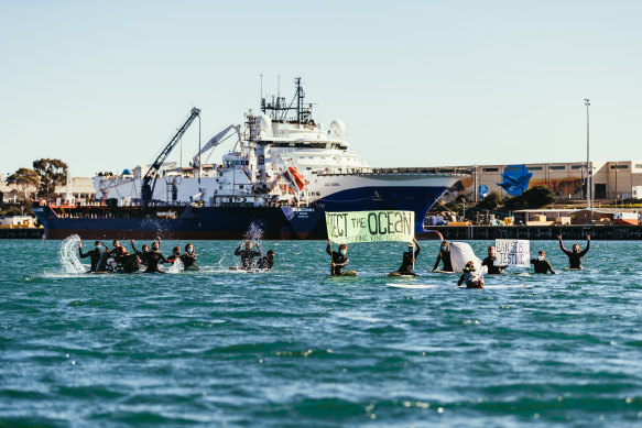 The environmental activists in Corio Bay on Sunday.