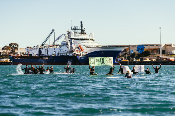 A group of environmental activists paddle out into Corio Bay to protest a seismic testing ship en route to Otway Basin off King Island.