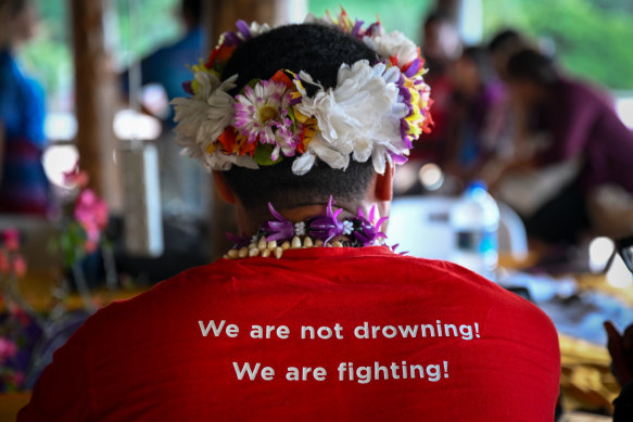 A delegate at the meeting in Kioa to discuss creating a regionally-specific loss and damages fund for islands affected by climate change. 