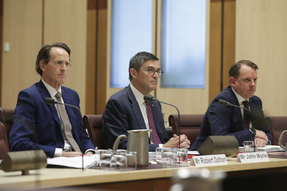 Australian Sports Commission acting CEO Robert Dalton, chair John Wylie and chief operating officer Luke McCann appear before a Senate committee examining the "sports rorts" affair.
