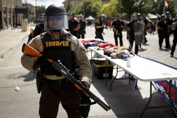 A trooper stands outside the BOK Centre where the rally was held.