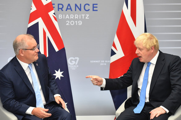 Scott Morrison and Boris Johnson talk trade in France, August 2019.