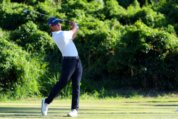 Karl Vilips of Australia plays his shot from the 17th tee.