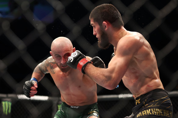 Islam Makhachev of Russia
lands a punch against Alex Volkanovski of Australia at RAC Arena on February 12, where the exorbitant ticket-scalping took place.
