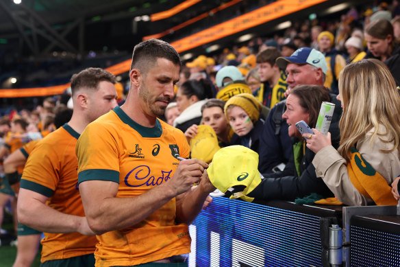 Jake Gordon meets Wallabies fans after the win over Wales.