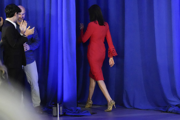 Nikki Haley walks off stage after announcing she was suspending her campaign.