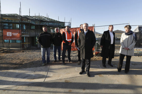 Prime Minister Scott Morrison announces the HomeBuilder program in Googong, with Fiona Kotvojs by his side.