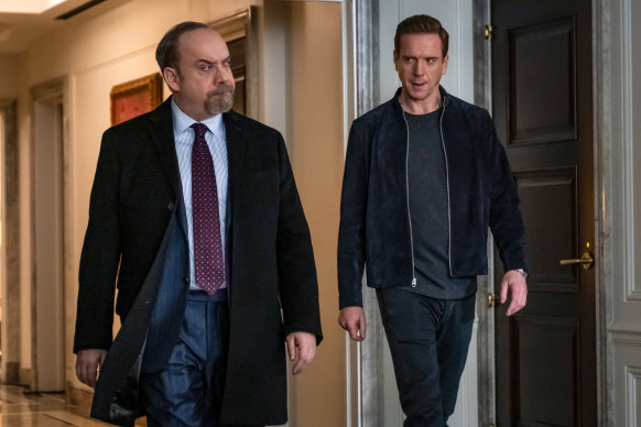 Chuck Rhoades (Paul Giamatti)  and Bobby “Axe” Axelrod (Damian Lewis) are the “good” and “bad” guys in Billions. 