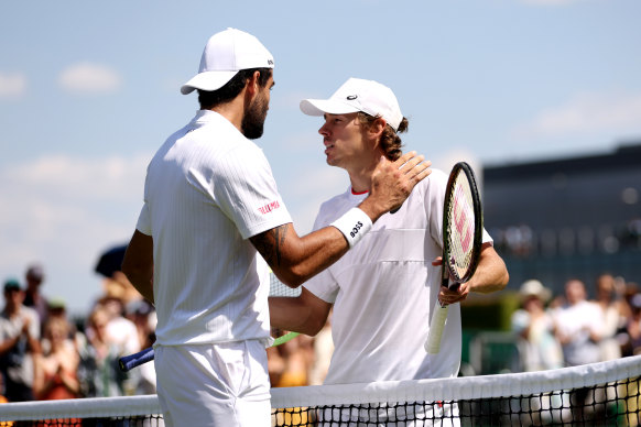 Matteo Berrettini interacts with Alex de Minaur following the men’s singles second round match.