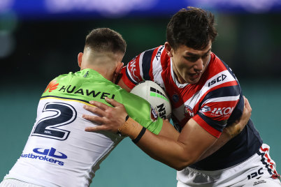 Joseph Manu is always a handful on the right edge for the Roosters.
