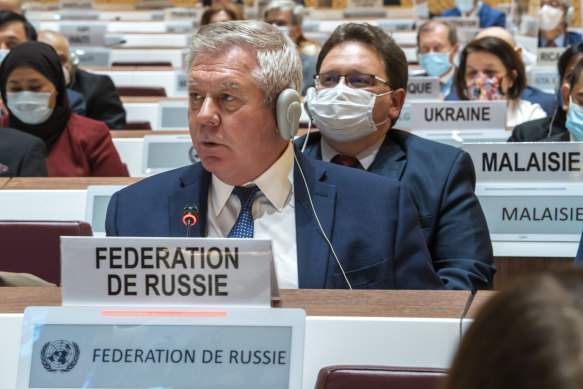 Russian ambassador Gennady Gatilov, left, and Ukraine’s ambassador Yevheniia Filipenko, far right, listen to a speech, during the 49th session of the UN Human Rights Council.