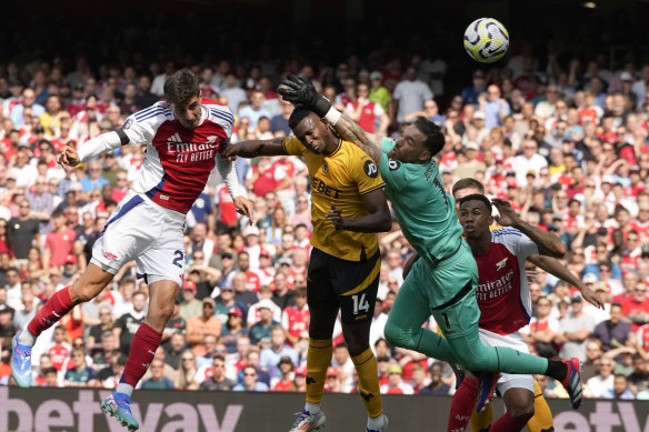 Arsenal’s Kai Havertz, left, scores his side’s opening goal.