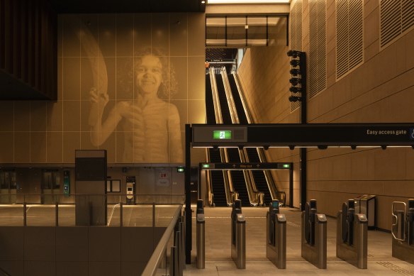 A new metro station at Waterloo features a giant mural of a local Aboriginal dancer.