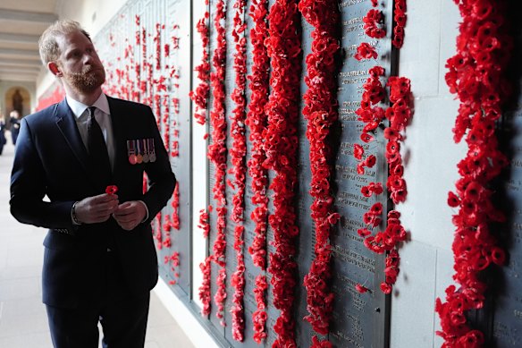 Prince Harry views the wall of remembrance at the Australian War Memorial.
