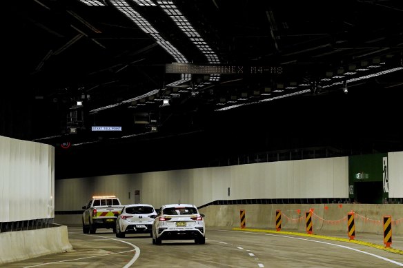 The first vehicles enter the WestConnex M4 and M8 extensions in St Peters on Thursday. It opens to the public on Friday.
