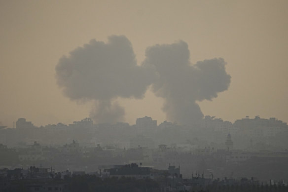 Smoke rises following an Israeli airstrike in the Gaza Strip, as seen from southern Israel, Sunday.