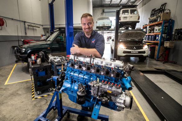 Mechanic Richard Brown is booked out for weeks because of the unprecedented run on used cars. 