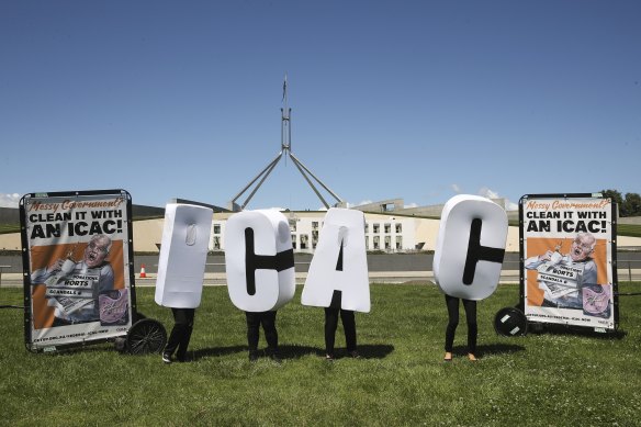 GetUp rally calling for a federal ICAC, on the front lawn of Parliament House in Canberra on Tuesday 30 November 2021