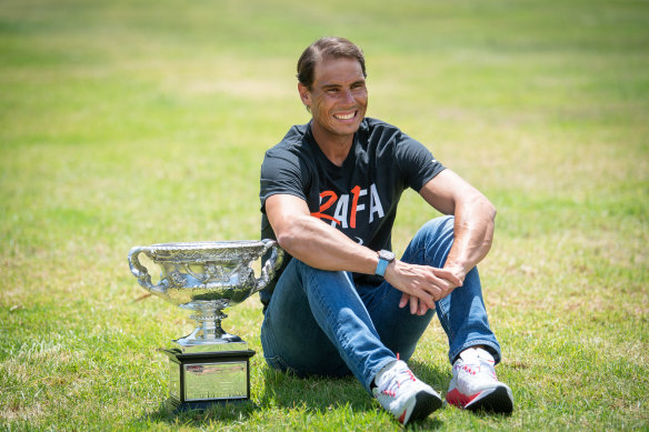 The prize: Rafael Nadal celebrates his Australian Open win on Monday.