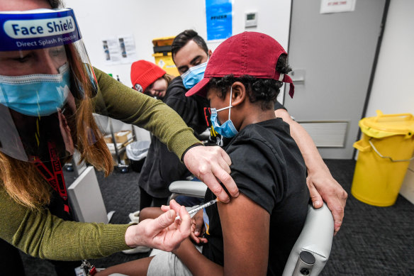 Mark Morgan, 13, visited the Victorian Aboriginal Health Services last week to get his Pfizer vaccine. 