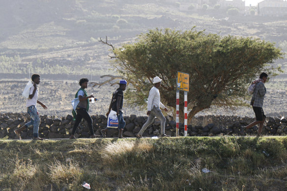 Ethiopian migrants on the outskirts of the Yemeni capital of Sana heading for the Saudi Arabian border, where some have faced violence at the hands of Saudi border guards.