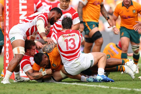 Taniela Tupou crosses for one of his two tries in Townsville.