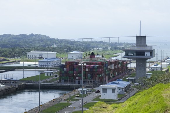 A cargo ship sails through Agua Clara locks of the Panama Canal in Agua Clara, Panama.