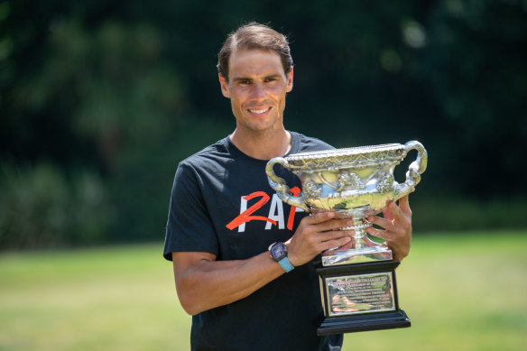 Australian Open 2022 winner Rafael Nadal poses with the Norman Brookes trophy at Government House on Monday.
